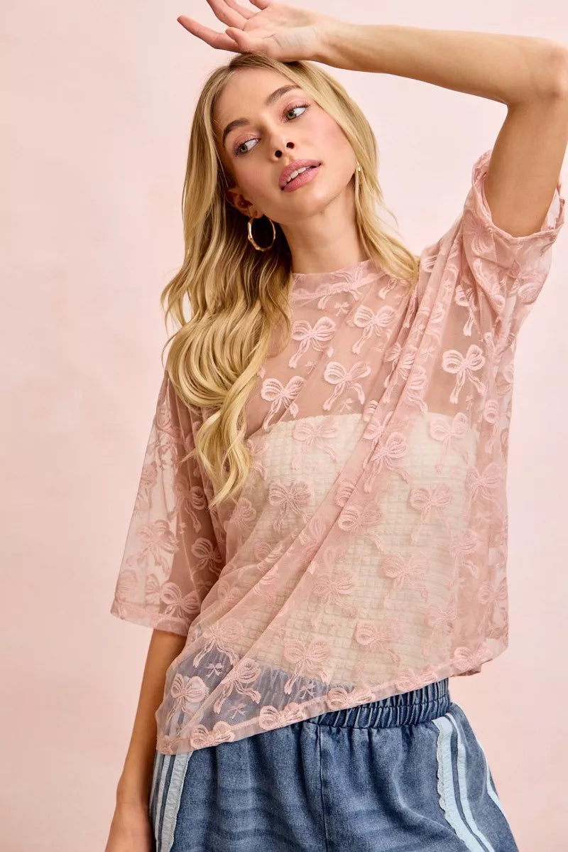 Dusty rose bow pattern mesh top, round neckline, loose boxy short sleeves