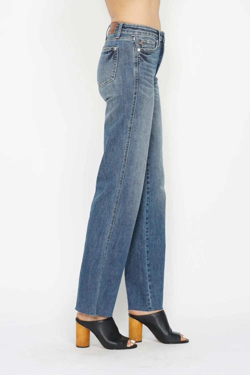 Rear side view medium wash straight jeans with zip fly and back pocket stitching