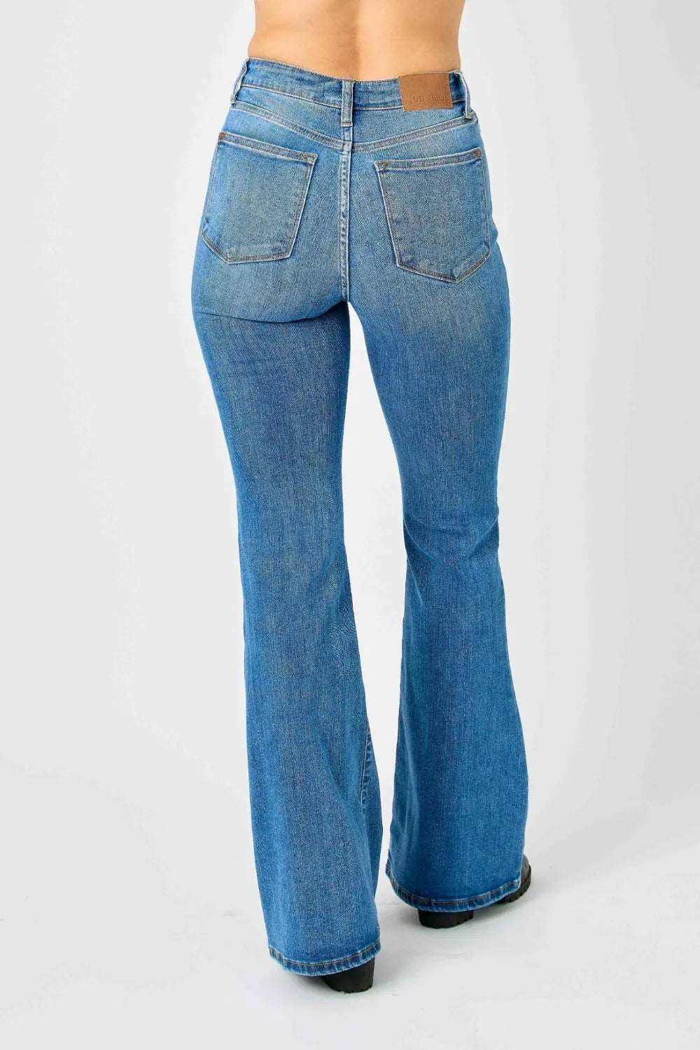 High-waisted flare jeans in medium-blue denim with two back pockets