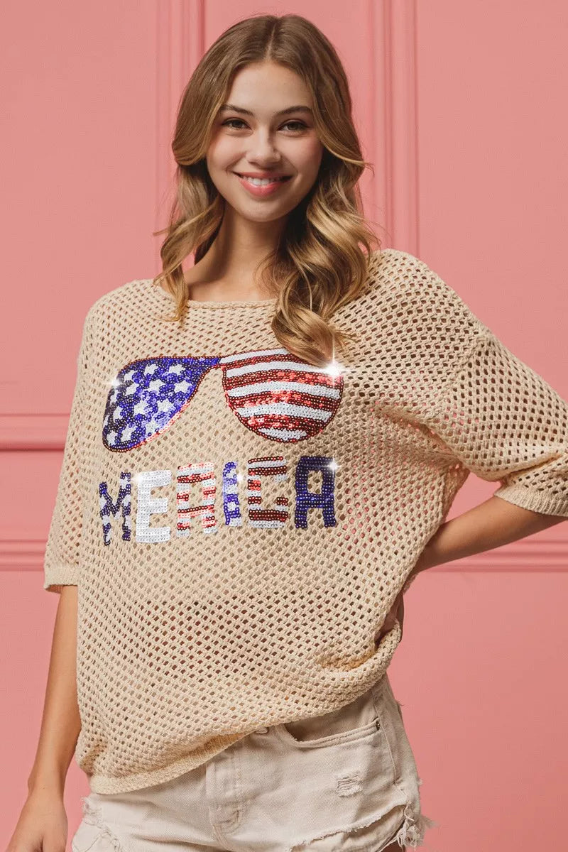 OATMEAL knit cover-up with sequin American flag sunglasses and 'ME&ED' graphic