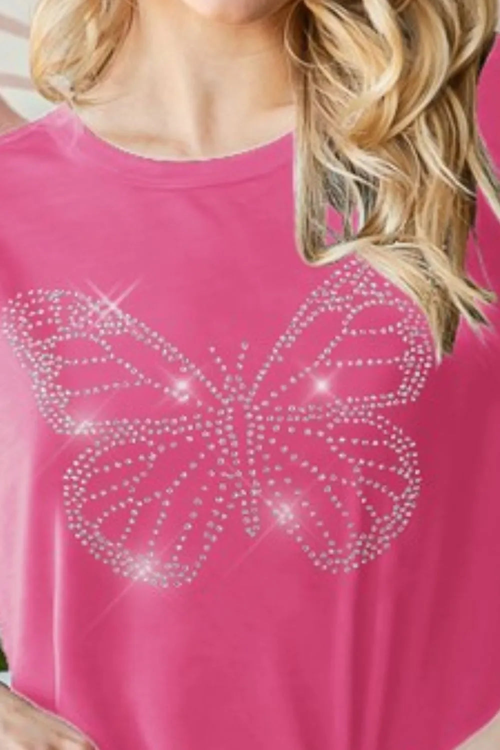 Pink rhinestone butterfly graphic on round-neck short-sleeve T-shirt