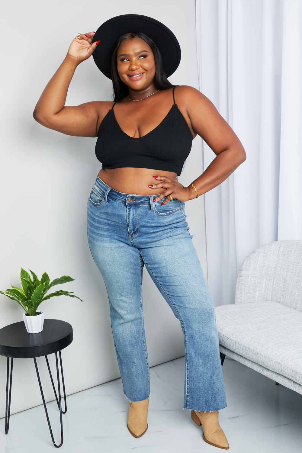 Black textured spaghetti strap bralette with V-neck front and fitted underband