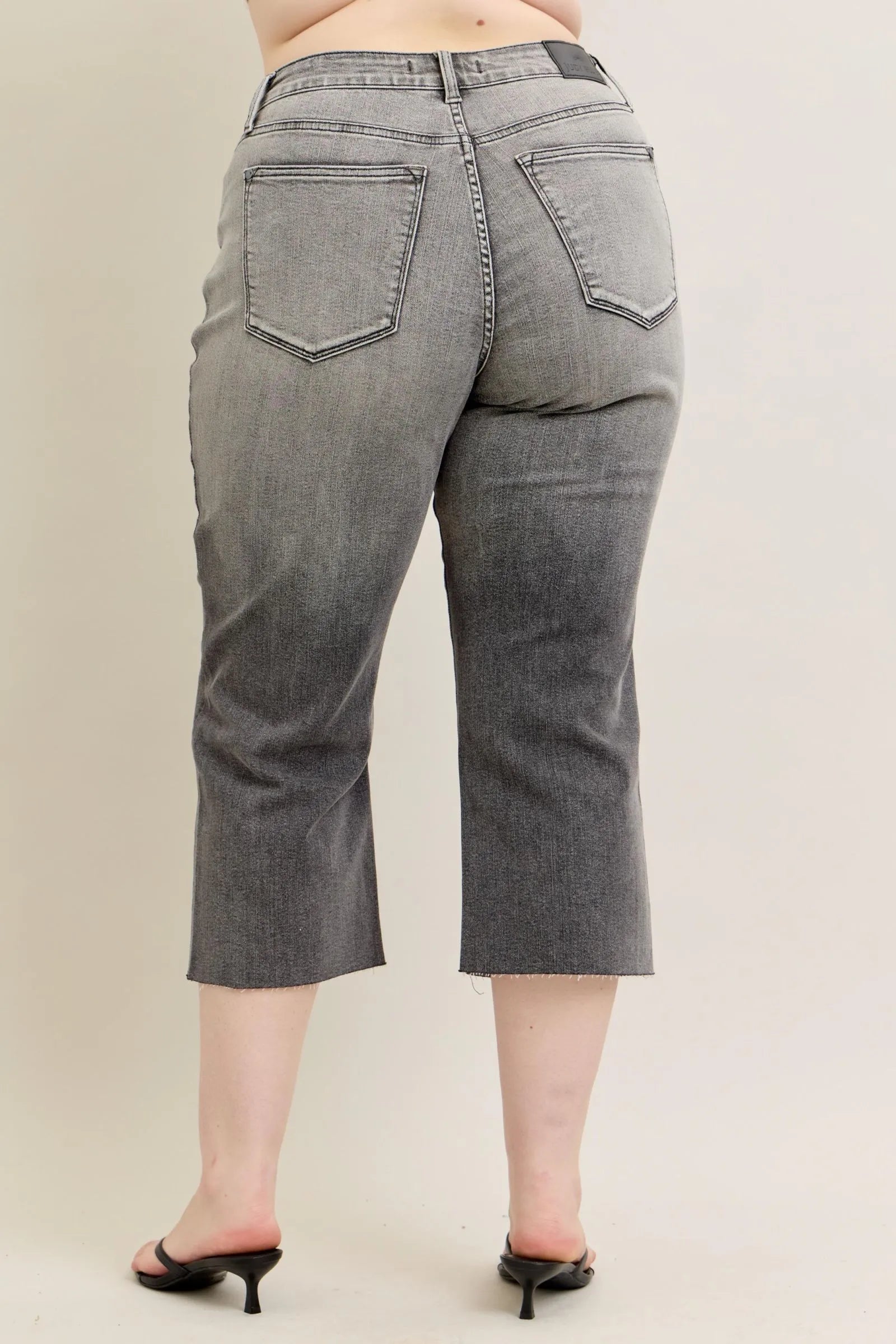 Gray wide-leg capri jeans, back view, large patch pockets and belt loops