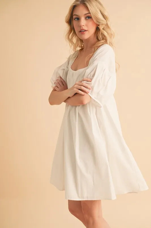 Aemi + Co white square-neck babydoll dress with loose fit