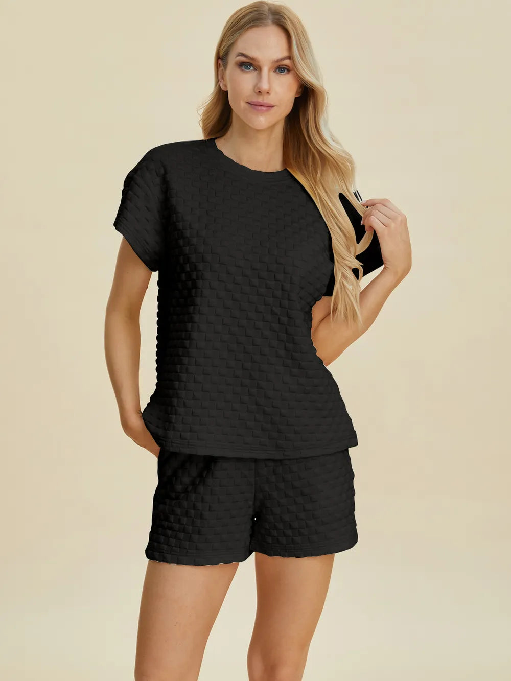 Black textured T-shirt and shorts set, front view with crew neck and short sleeves.