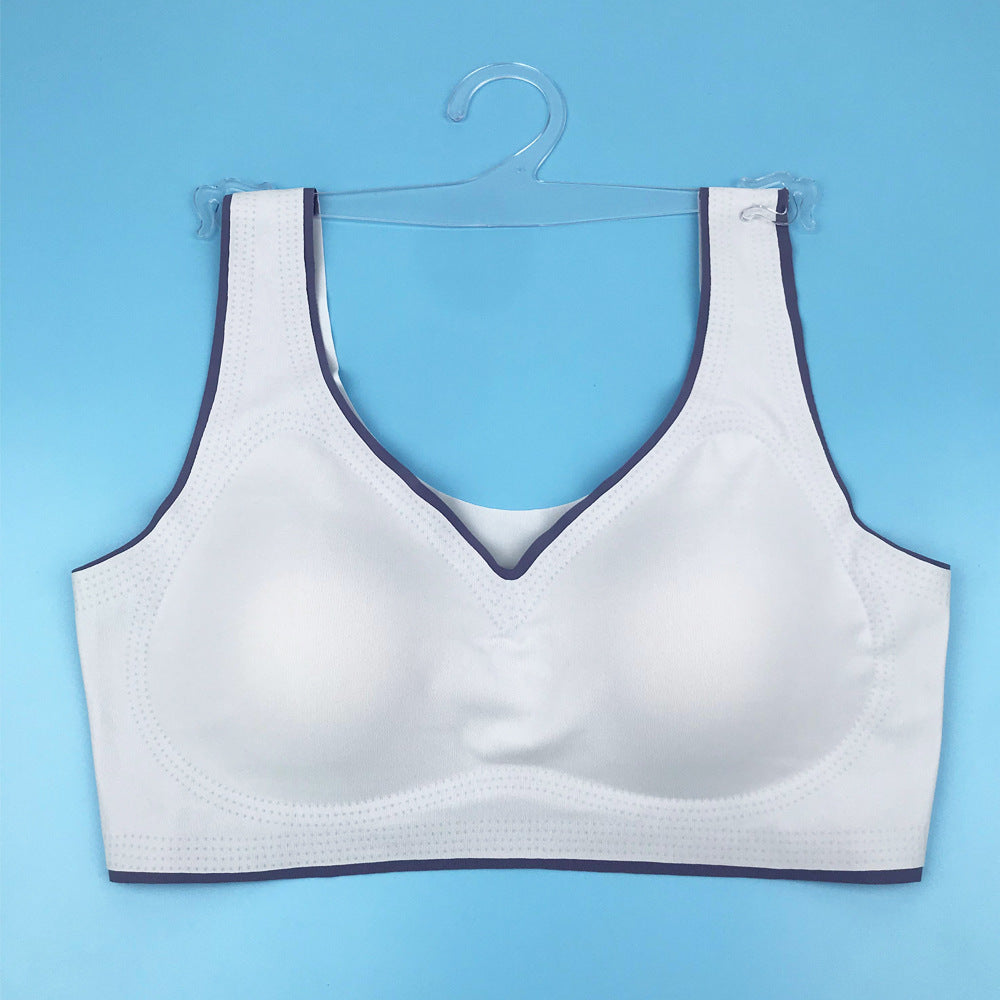 White seamless back bra with V-neckline and wide straps, flat lay on hanger