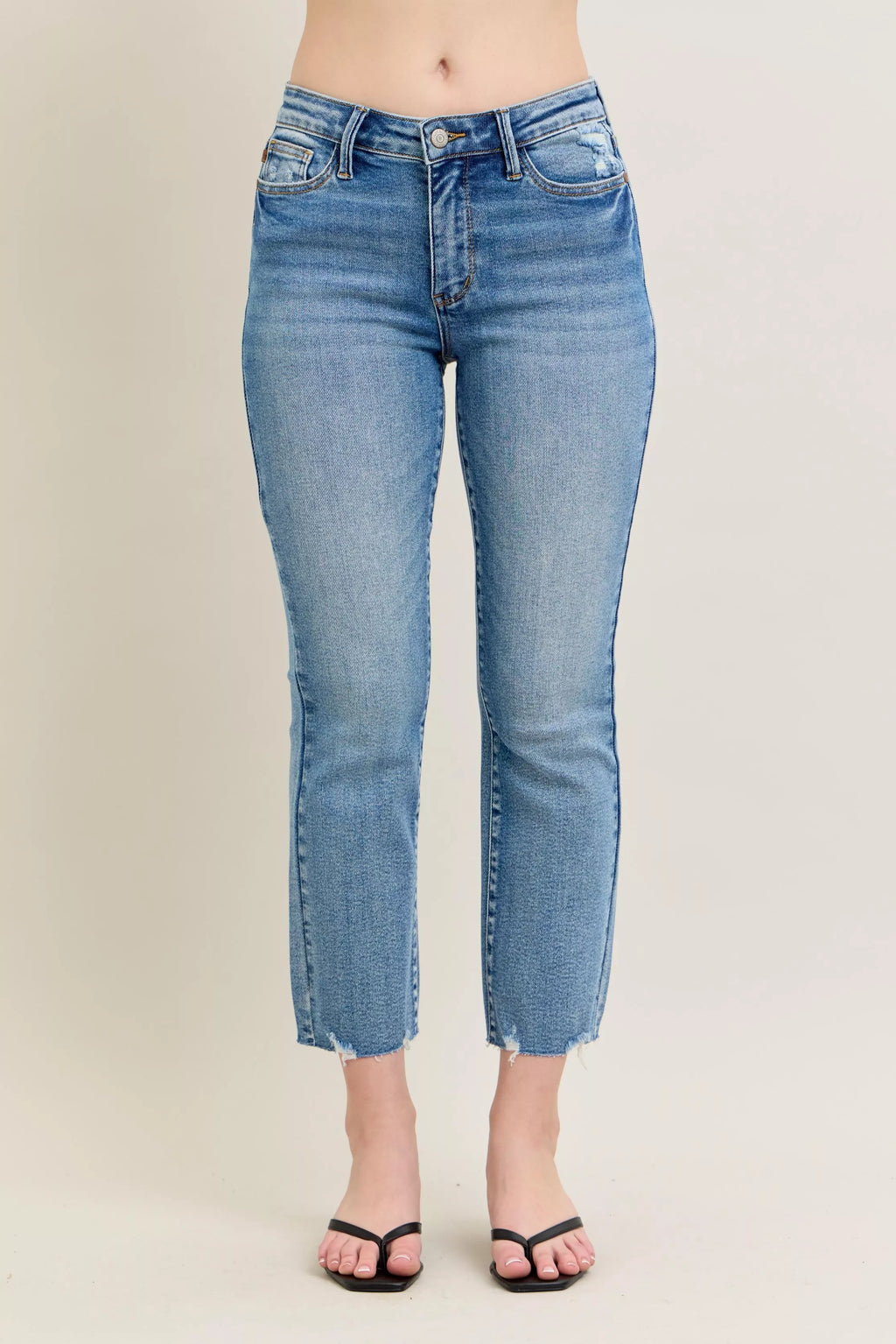 Judy Blue medium-wash kick flare jeans with frayed destroy hem