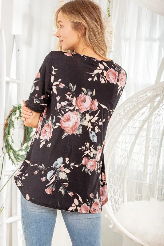 Black floral babydoll top, back view with crew neck and short sleeves