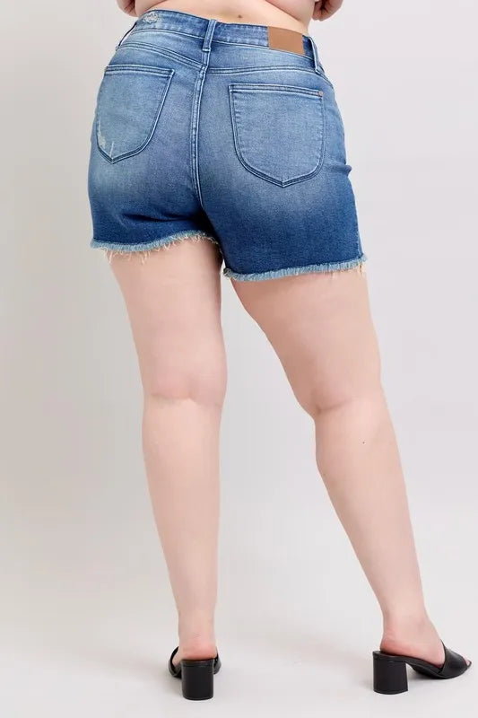 Blue denim shorts back view with frayed hem and two rear flap pockets
