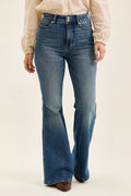 Dark denim high-waist flare jeans with double-button closure and five-pocket design