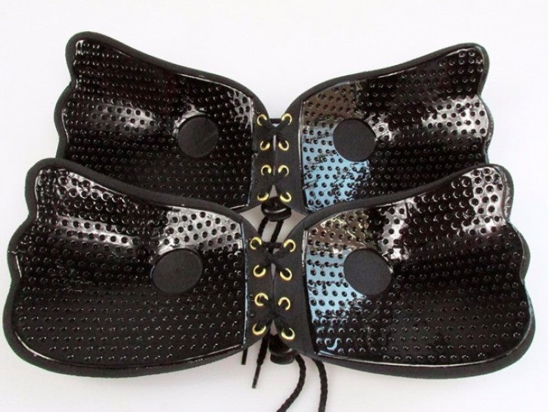 Strapless seamless bra, black cups with perforated texture and lace-up center tie