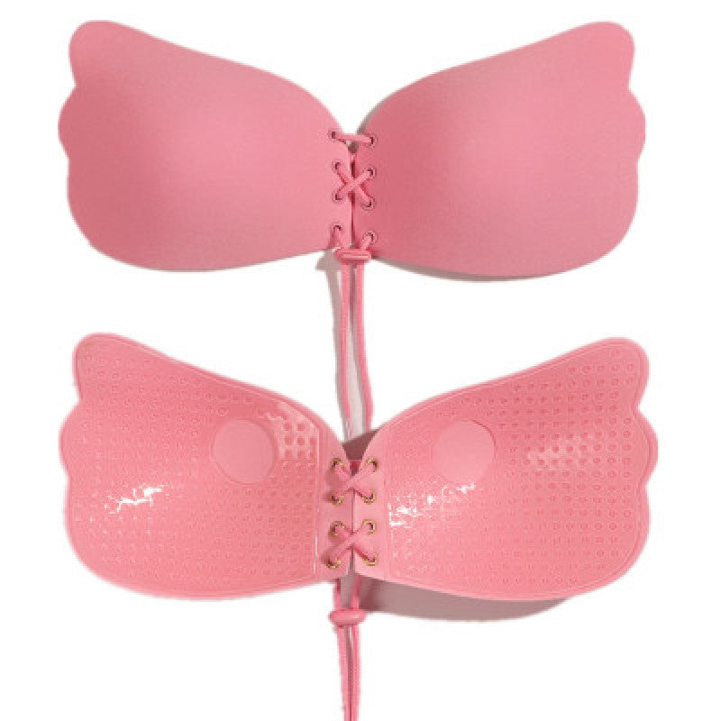 Strapless seamless bra, pink cups with lace-up center and thin tassel ties