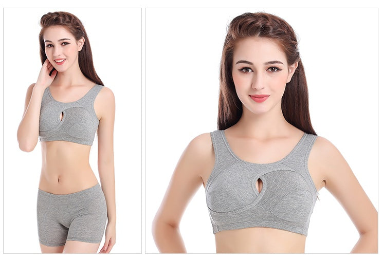 Gray cotton sports bra on model with center cutout and wide straps