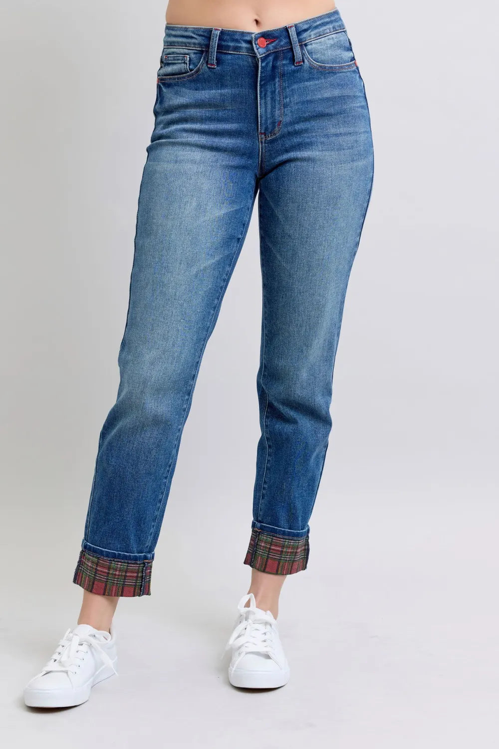Medium wash straight-leg jeans with plaid cuffs and front pockets