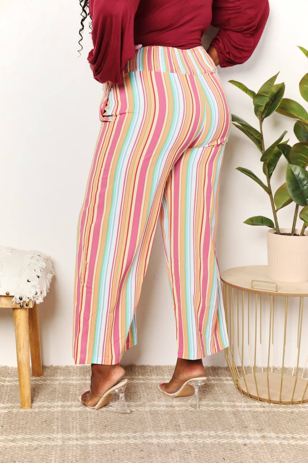 Vertical striped pants with smocked waistband, wide-leg cut and pockets