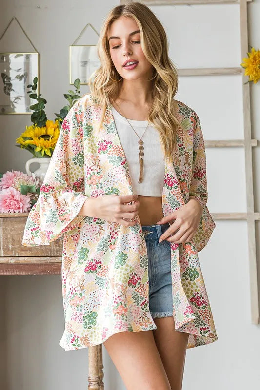 Ivory multi floral open cardigan, plus size; side view with flowing hem