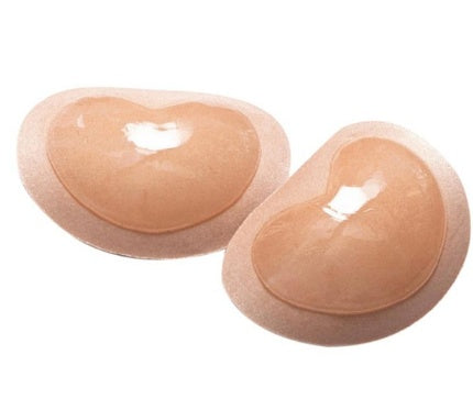 Silicone nipple covers bra pads, tan beige oval pads, pair on white
