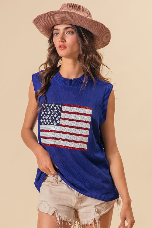 Royal blue knit vest with sequin American flag patch on front