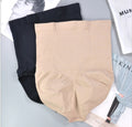 Nude and black high-waisted shaping panties set, folded for display