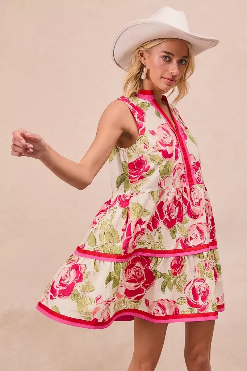 Coral floral tiered mini dress, sleeveless V-neck with bright pink contrast edging