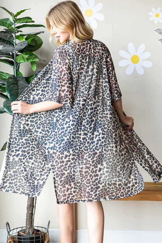 Taupe leopard print open-front cardigan with short sleeves, flowing mid-calf length
