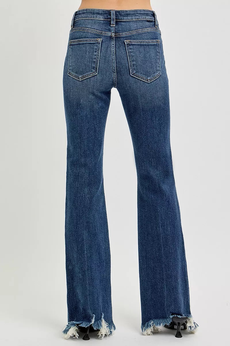 Dark blue mid-rise flare jeans with back pockets and frayed hem