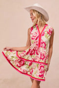 Coral rose print mini dress with V-neck, contrast pink trim, tiered ruffle hem
