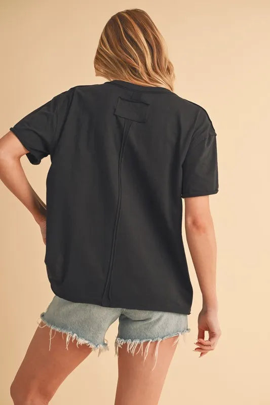 Black short-sleeve V-neck T-shirt, back view with center seam
