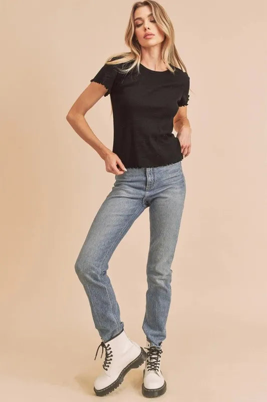 Black T-shirt with round neck and lettuce-trimmed short sleeves