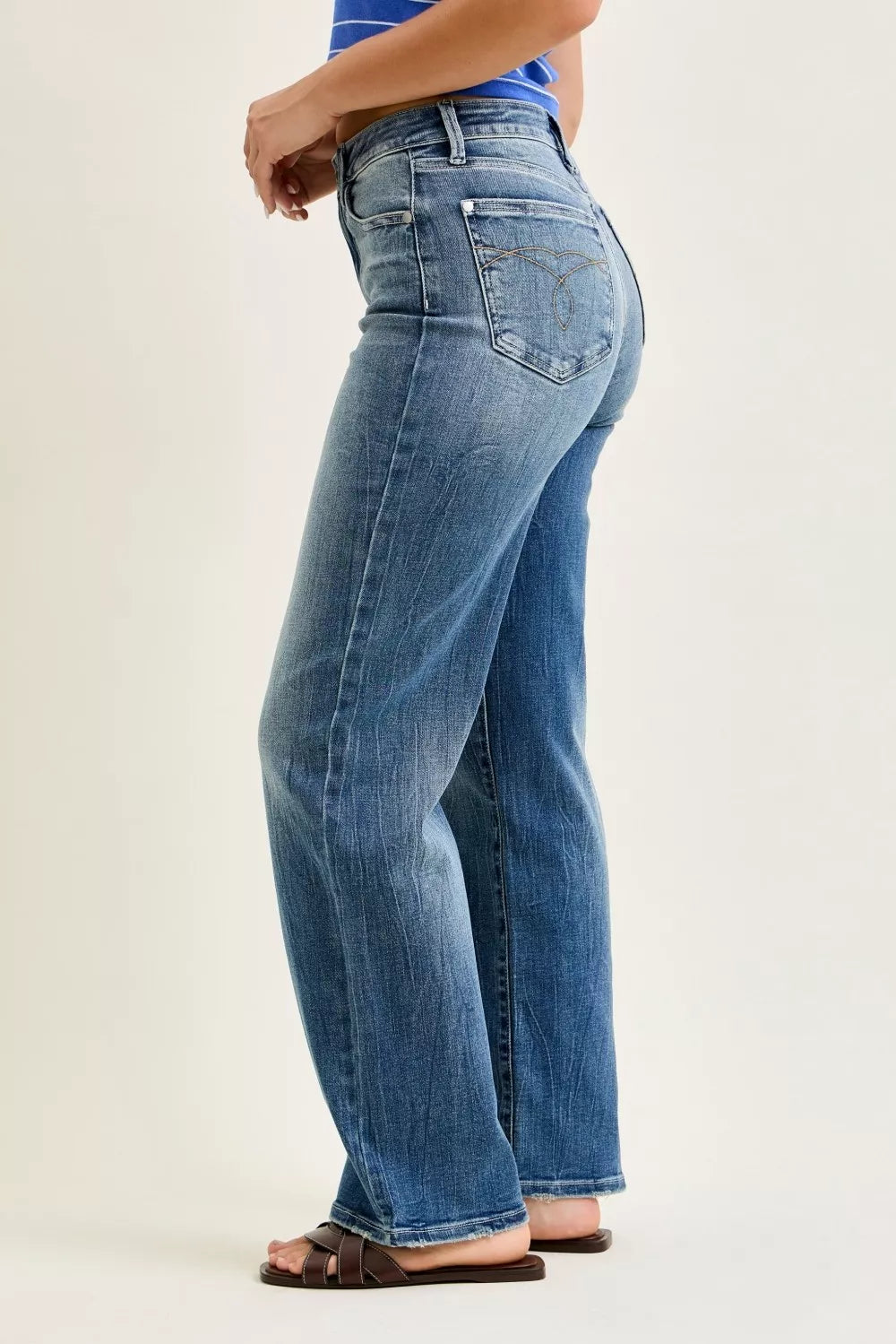 Mid-rise 90s straight jeans in medium wash, back seam and stitched detailing