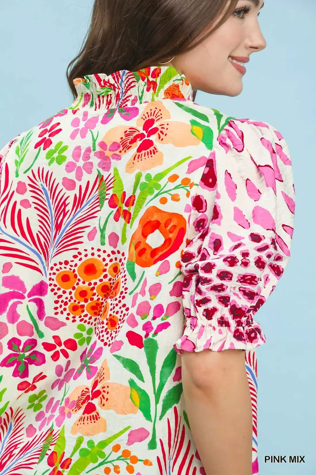 Puff sleeve blouse with ruffle trim and pink mix floral print detail