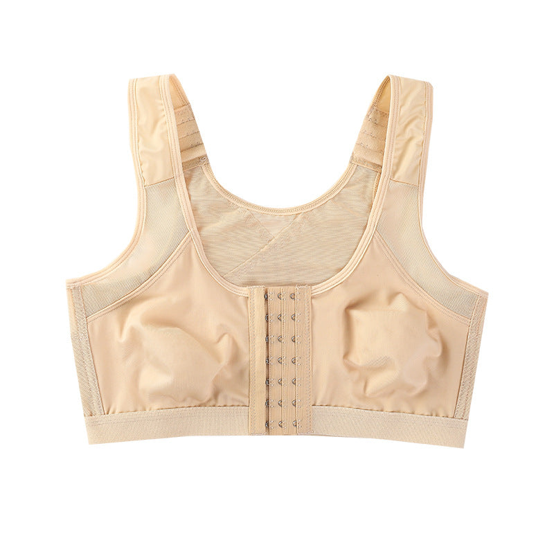 Beige shockproof sports bra with front hook-and-eye closure and wide underband