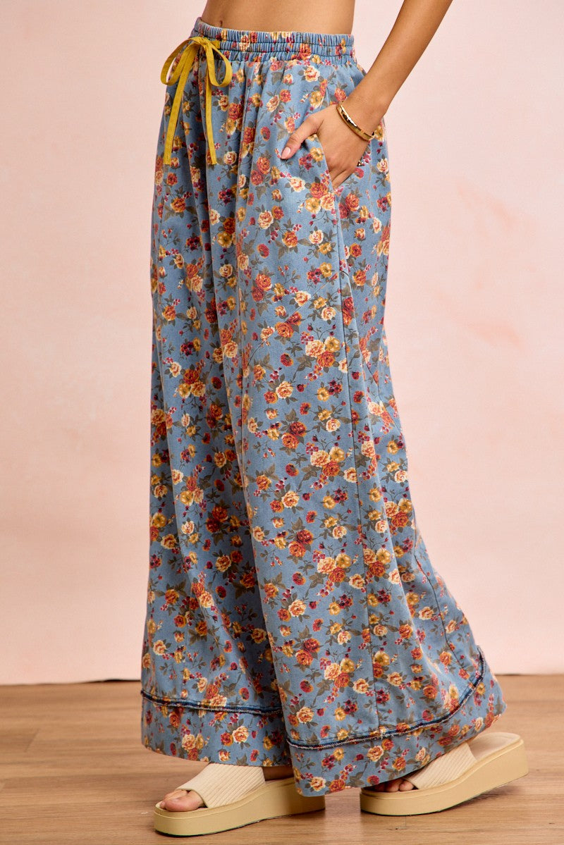 Floral wide-leg pants, denim blue, side view; elastic waistband with drawstring