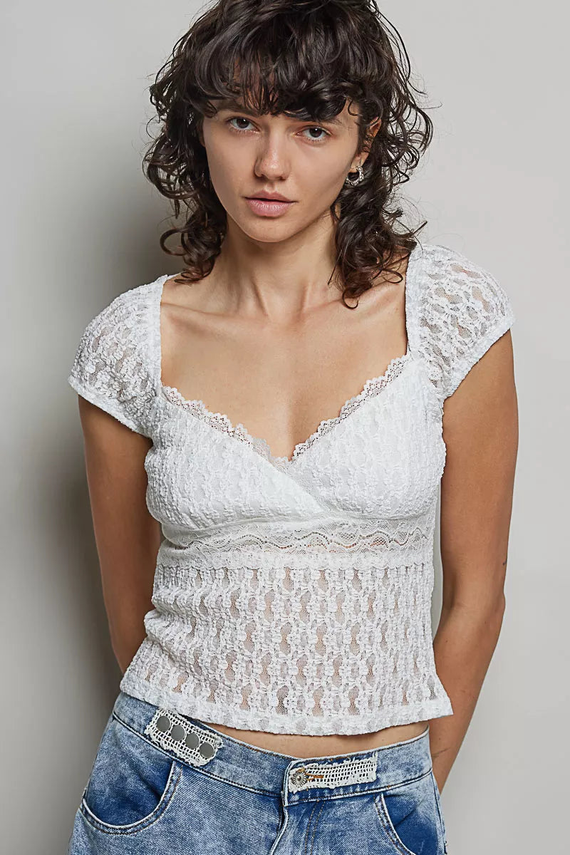Off-white lace short-sleeve top with sweetheart neckline and textured waist detail