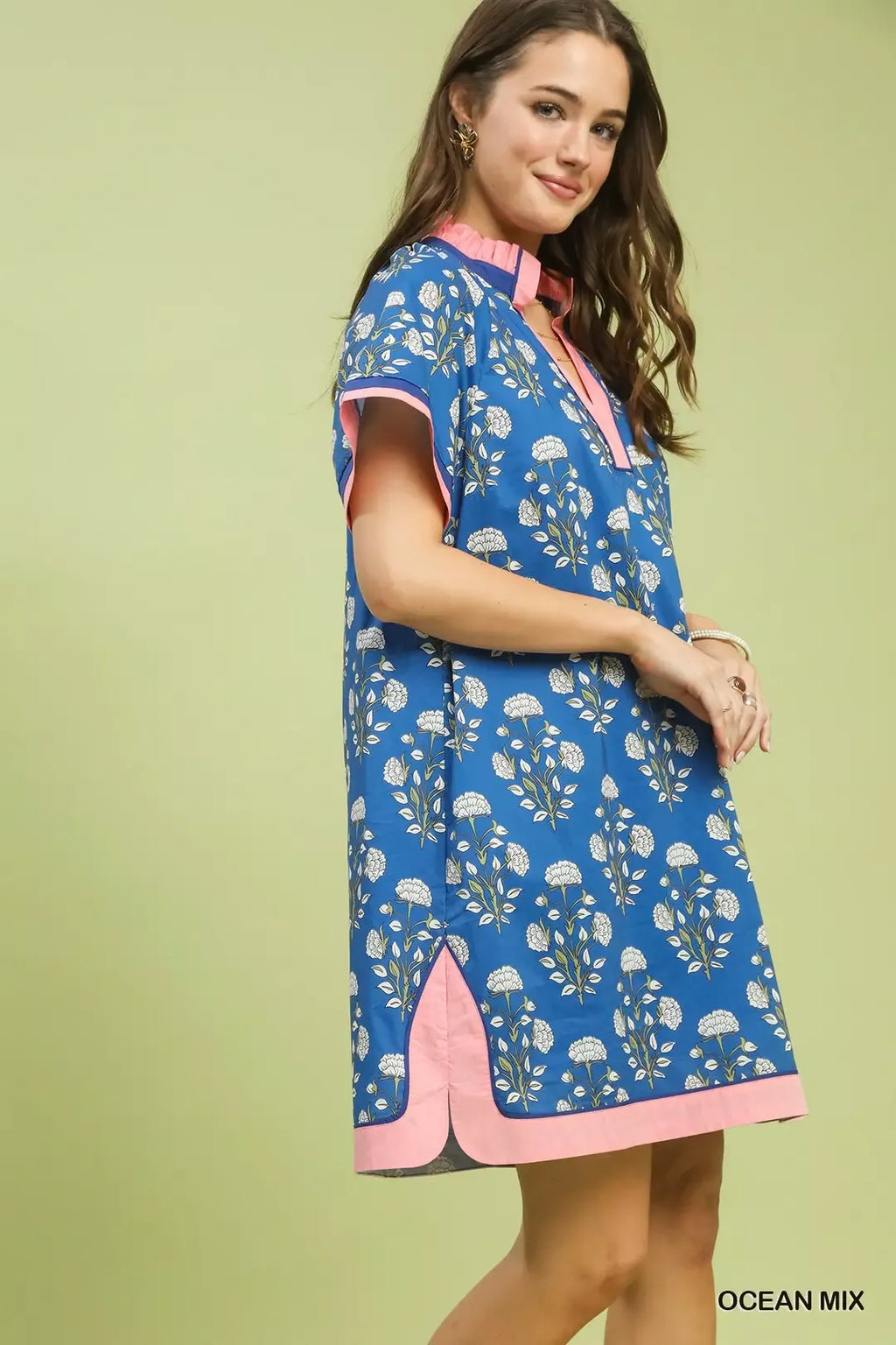 Blue floral shift dress with split V neckline and short sleeves, pink facing