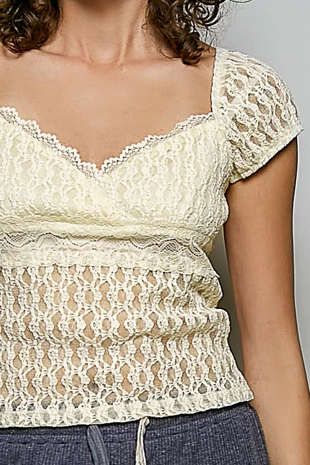 Natural lace sweetheart neckline short-sleeve top with scalloped edge and textured lace