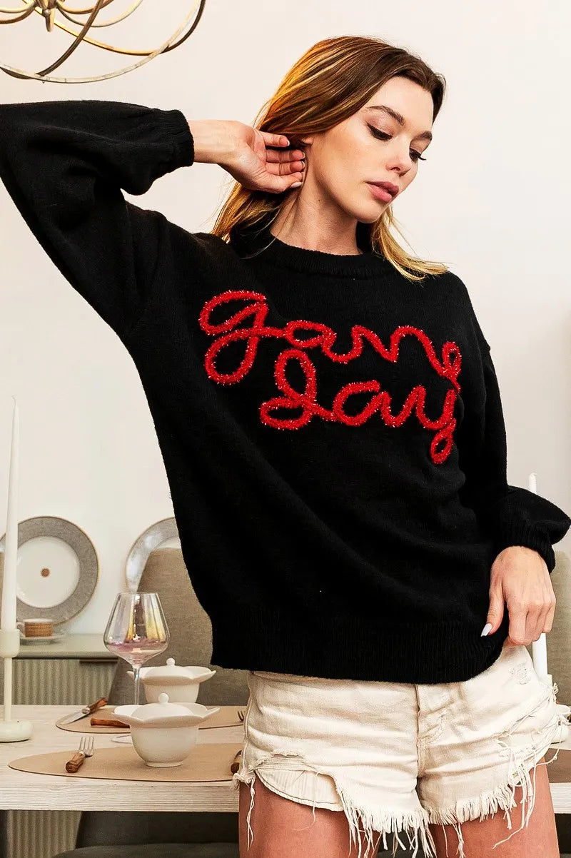 Black sweater with red “Game Day” lettering on chest, crew neck pullover