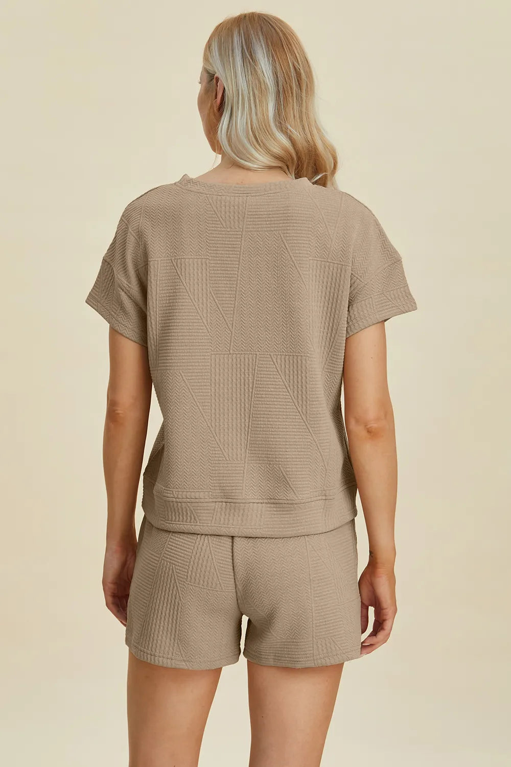 Back view of khaki textured crew-neck top and drawstring shorts set