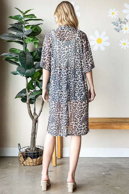 Back view of taupe leopard print open-front cardigan with short sleeves
