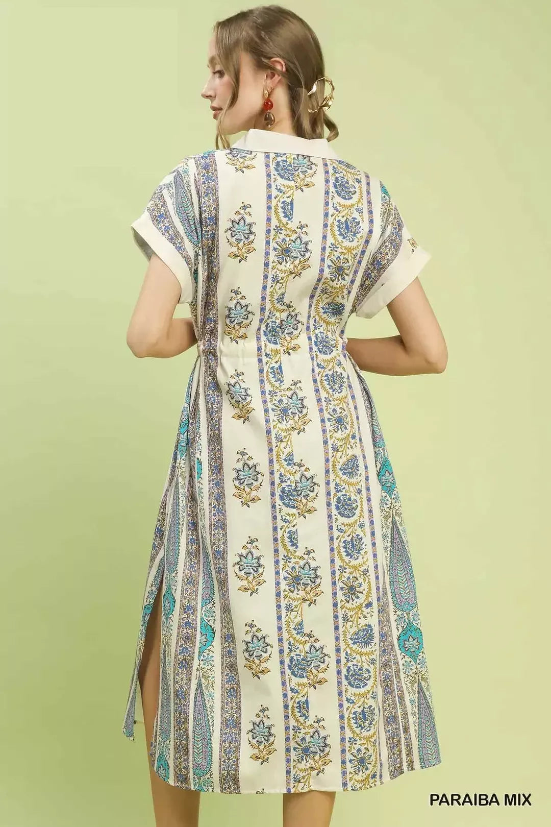 Back view of tie-waist midi dress with vertical print, short sleeves, side slit