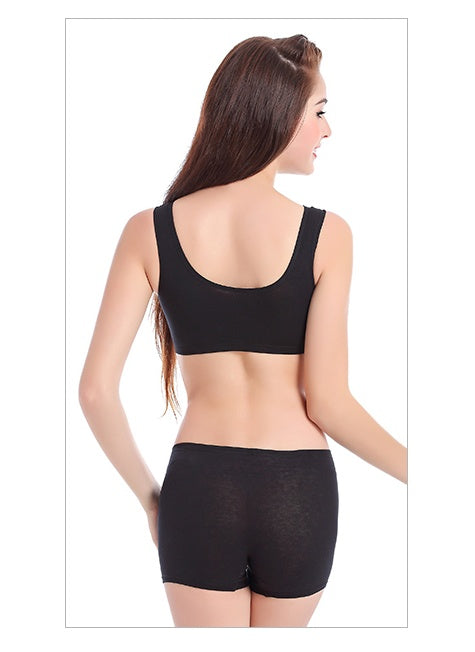 Black cotton sports bra with racerback back and center cutout