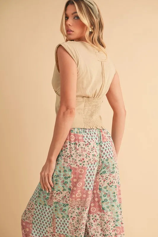 Aemi+Co mint/pink floral patchwork wide-leg pants, waistband and leg pattern visible