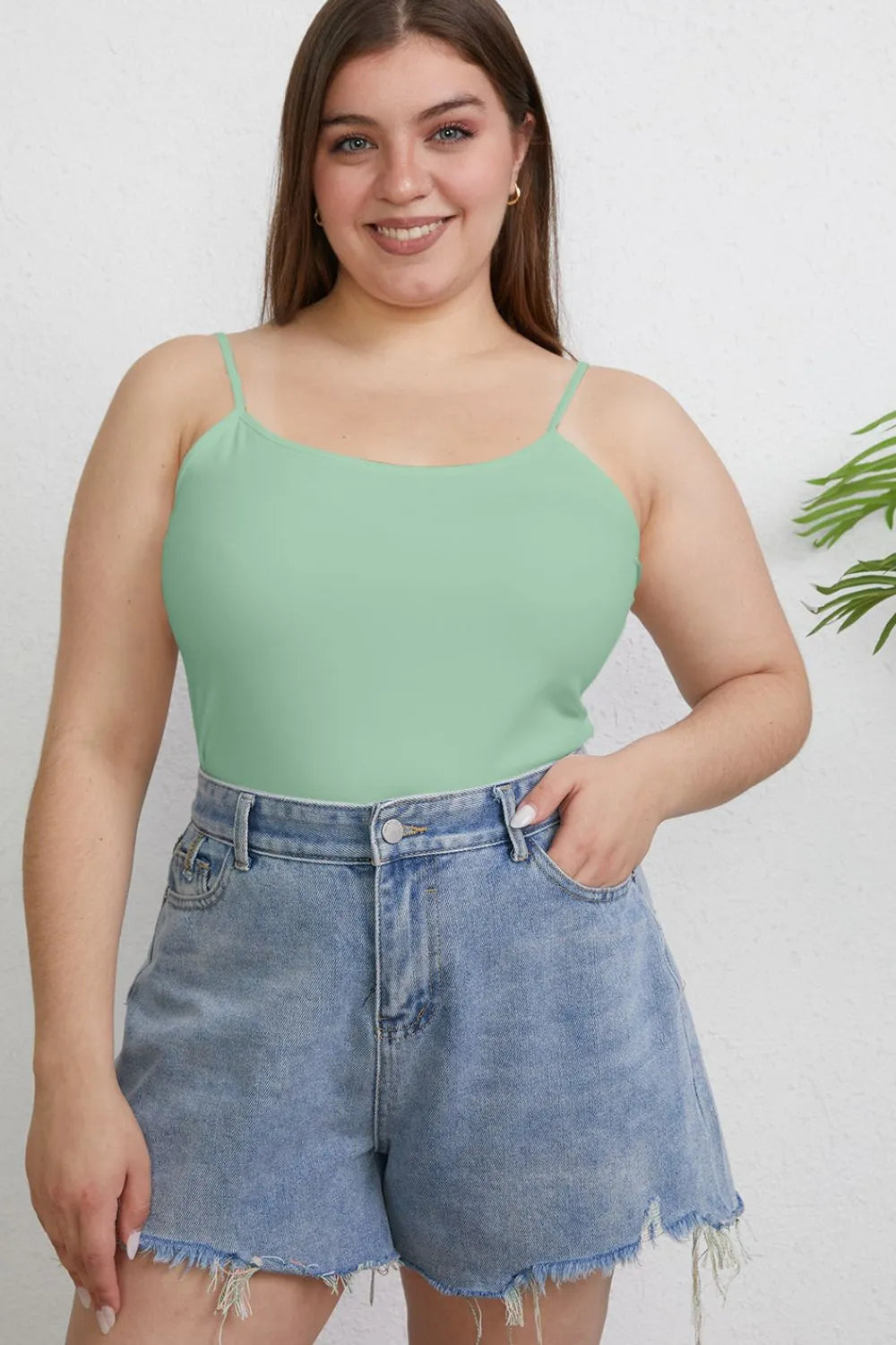 Light green slim cami with round neck, spaghetti straps, plus-size fit