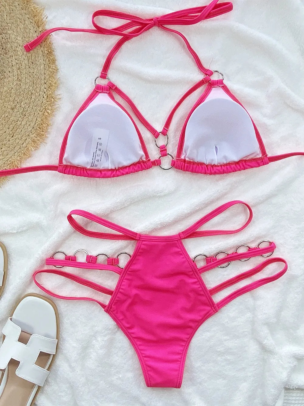 Hot pink triangle halter bikini top and matching high-cut bottom set