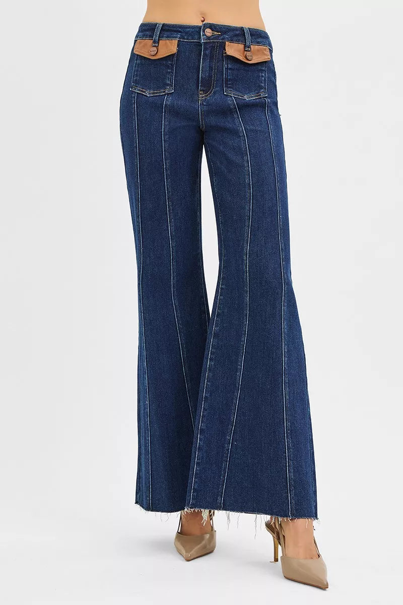 Rear view of dark blue high-rise wide flare jeans with back yoke and pockets