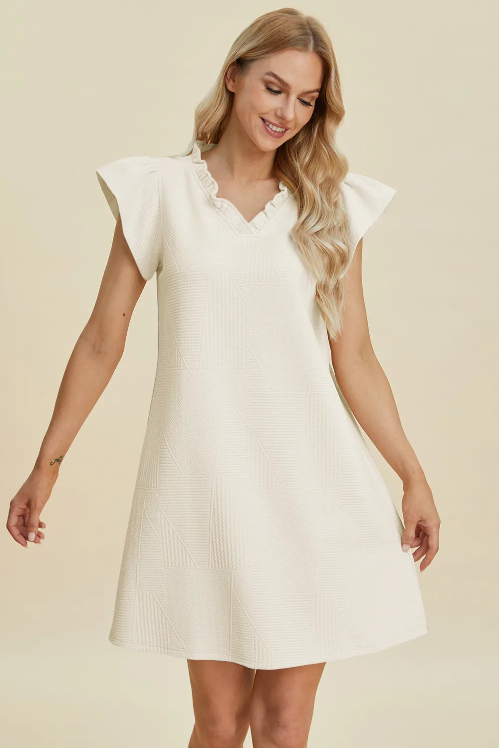 Cream ruffled V-neck cap sleeve dress, V-neck with ruffle trim and flare skirt