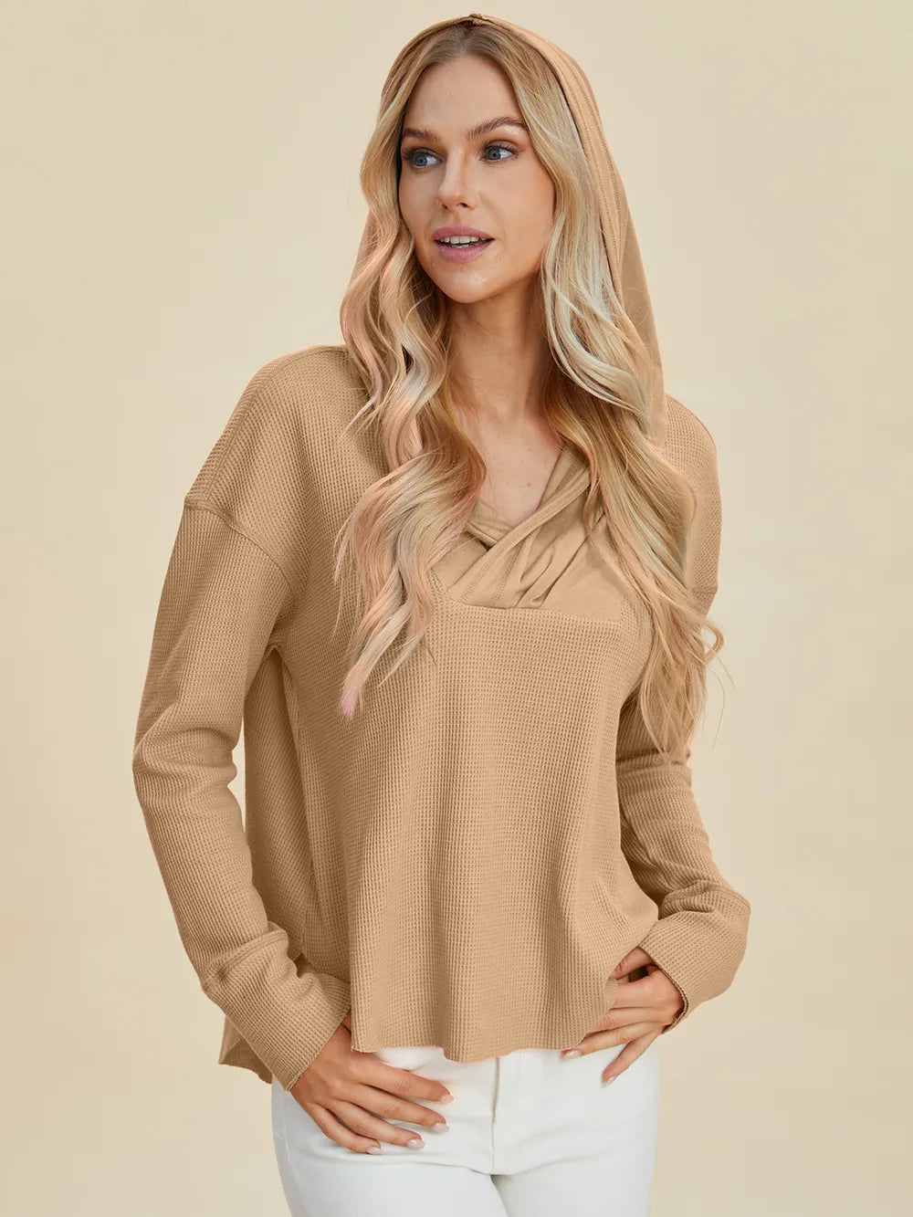 Camel hoodie with crisscross cowl neckline and dropped shoulders
