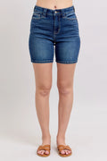 High-waist denim bermuda shorts in dark blue with front button closure
