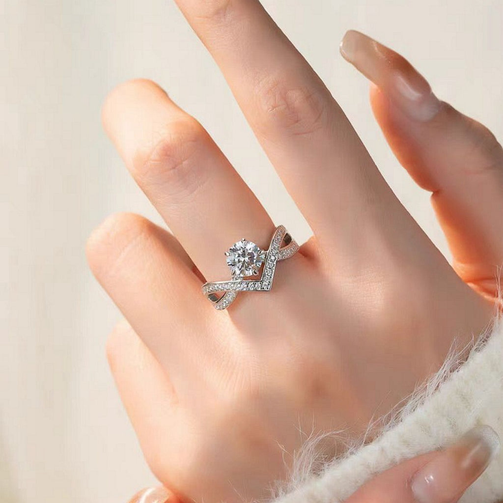 1 carat moissanite ring, round center stone and V pavé side design