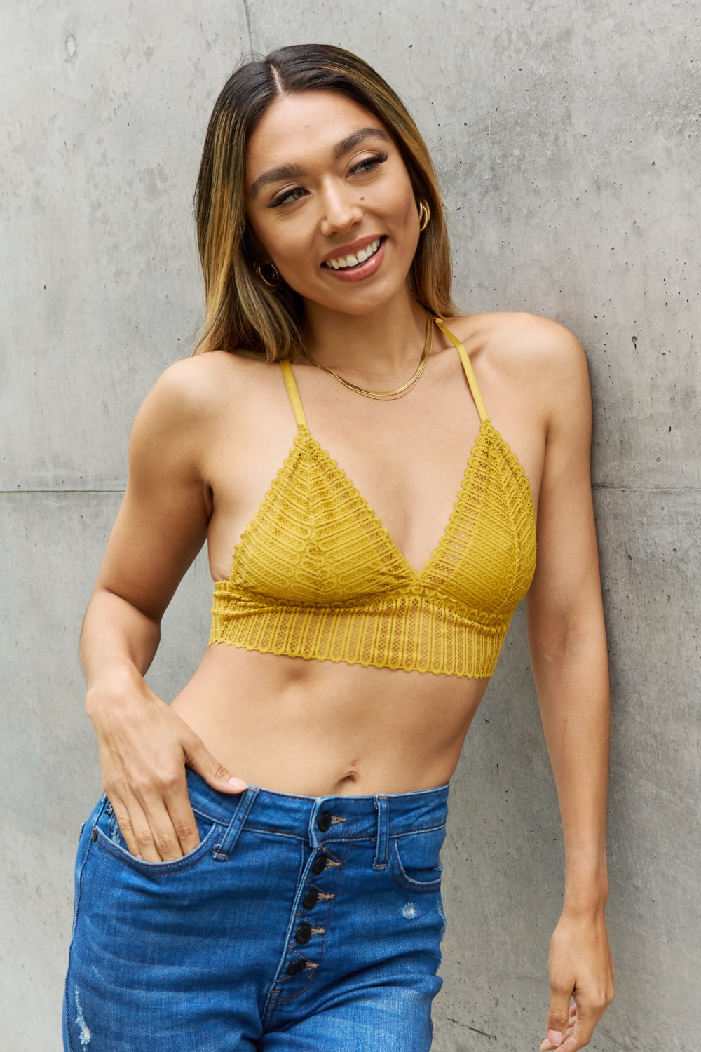 Chartreuse crochet-style V-neck racerback bralette with textured lace triangle cups